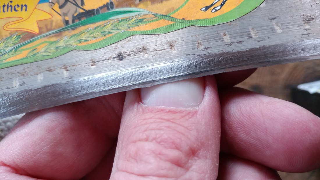 scythe sharpening peening