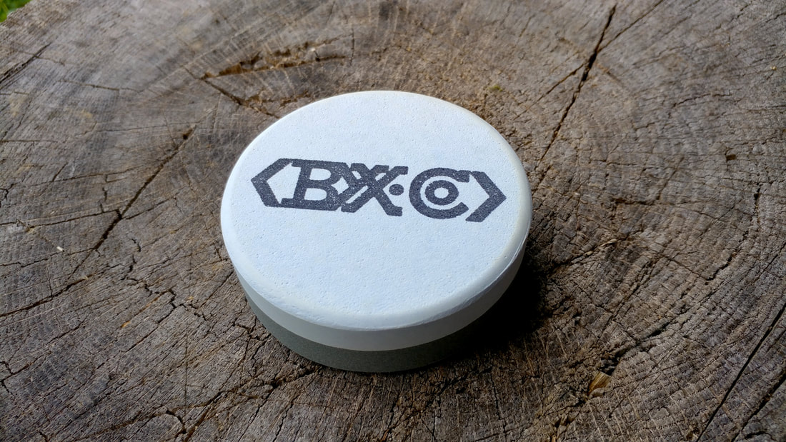 Sportsman axe puck