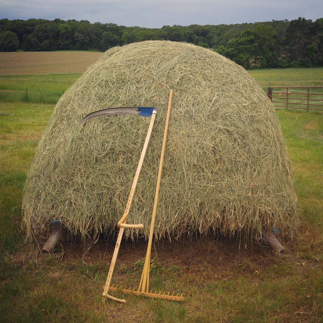 scythe hay stack